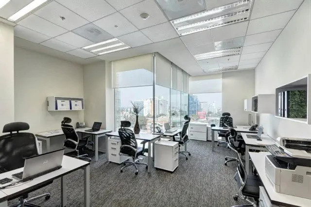 Office interior with ceiling lights and ventilation outlets